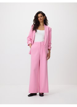 Reserved - Spodnie z szerokimi nogawkami - różowy ze sklepu Reserved w kategorii Spodnie damskie - zdjęcie 189274906