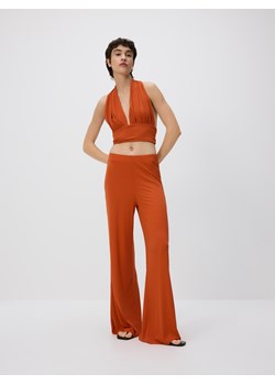 Reserved - Prążkowane spodnie flare - pomarańczowy ze sklepu Reserved w kategorii Spodnie damskie - zdjęcie 189276058