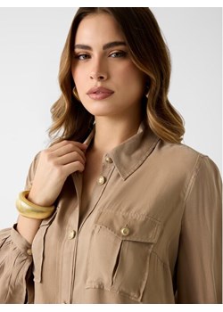 Guess Top 181460 Beżowy Classic Fit ze sklepu MODIVO w kategorii Bluzki damskie - zdjęcie 189282949