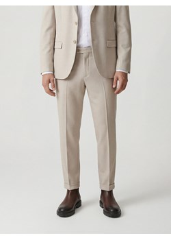 Reserved - Garniturowe spodnie w kant - beżowy ze sklepu Reserved w kategorii Spodnie męskie - zdjęcie 189287118