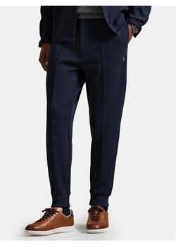 Polo Ralph Lauren Joggery 710B13640002 Granatowy Regular Fit ze sklepu MODIVO w kategorii Spodnie męskie - zdjęcie 189318499
