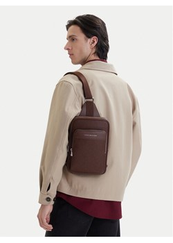 Tommy Hilfiger Saszetka Th Flag Monogram Sling Pack AM0AM14140 Brązowy ze sklepu MODIVO w kategorii Torby męskie - zdjęcie 189322846