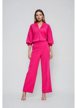 Spodnie z kantem różowe ze sklepu Moodo.pl w kategorii Spodnie damskie - zdjęcie 189324266