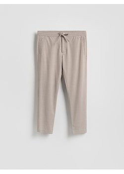 Reserved - Spodnie joggery - beżowy ze sklepu Reserved w kategorii Spodnie męskie - zdjęcie 189324718