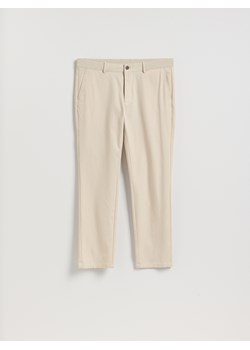 Reserved - Spodnie chino slim fit - beżowy ze sklepu Reserved w kategorii Spodnie męskie - zdjęcie 189343189