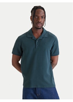 Calvin Klein Jeans Polo Easy Micro Waffle LV04RF205G Zielony Regular Fit ze sklepu MODIVO w kategorii T-shirty męskie - zdjęcie 189367177