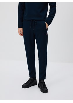 Reserved - Spodnie dresowe slim - granatowy ze sklepu Reserved w kategorii Spodnie męskie - zdjęcie 189383508