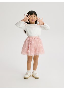 Reserved - Bawełniana bluzka z falbanką - złamana biel ze sklepu Reserved w kategorii Bluzki dziewczęce - zdjęcie 189383535