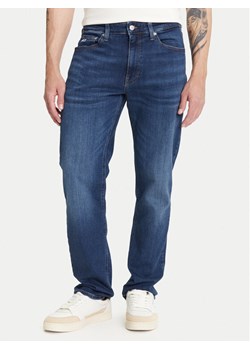 Tommy Jeans Jeansy Ryan DM0DM21892 Granatowy Straight Fit ze sklepu MODIVO w kategorii Jeansy męskie - zdjęcie 189387376
