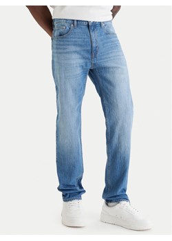 HUGO Jeansy Ash 50555955 Niebieski Slim Fit ze sklepu MODIVO w kategorii Jeansy męskie - zdjęcie 189387535